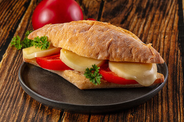 Sandwich with mozzarella and tomato