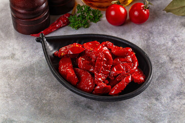 Tasty dried tomatoes in the bowl