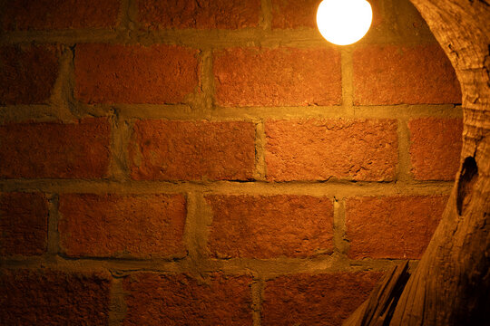 Brick wall in the dark with lights