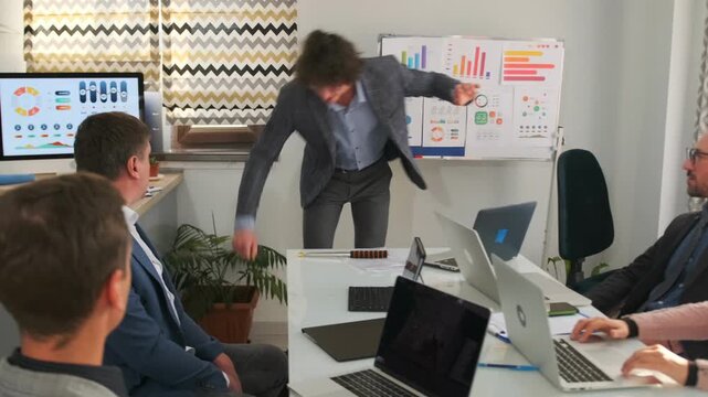 Manager in suit opens suitcase of cash and distributes dollar bills as bribes during office meeting, illustrating corruption, fraud, and illegal money exchange. 