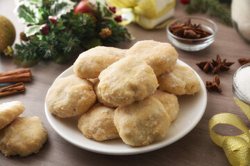 Anise cookies with cinnamon and sugar on festive decorated table
