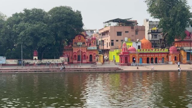 Chakraghat Sagar riverfront with temples and greenery in Sagar Madhya Pradesh India, featuring historic architecture, religious ghats, and tranquil waterfront scenery