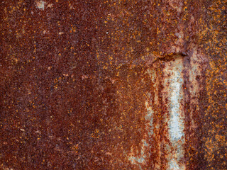 Heavily rusted metal surface texture with orange brown corrosion oxidation and weathered deterioration pattern background