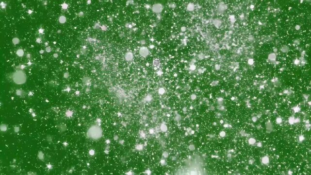 Green Sparkling Stars - The video displays a vibrant green background filled with an array of twinkling white stars and bokeh lights.