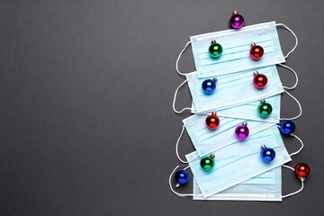 
blue medical masks in the shape of a Christmas tree