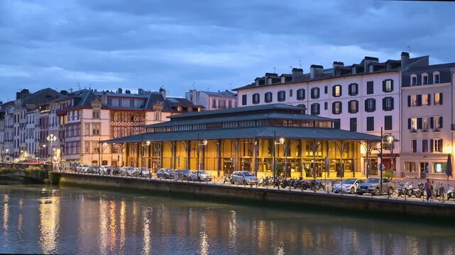 Evening View of the Illuminated Halles de Bayonne Market Hall &mdash; Steel & Glass Structure in Bayonne, France