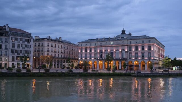 Bayonne, France &ndash; Evening View of the City Hall on the River Nive at Dusk