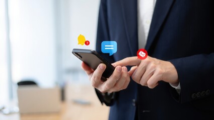 Businessman using smartphone with social media notifications and chat bubbles