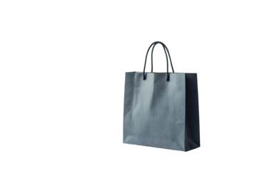 Shiny blue gift bag with handles isolated on transparent background. Blue shopping bag standing on white background.
