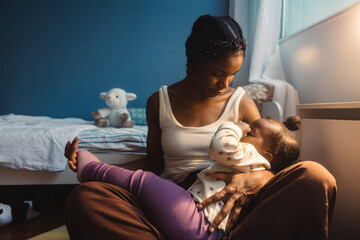 Mother lovingly caring for her child during the night