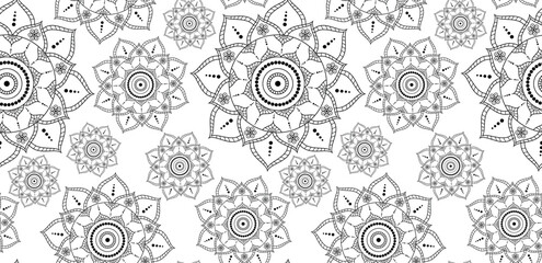 Ornamental mandala motif design with delicate repetitive elements. Seamless pattern in vector.