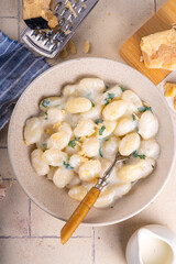 Gnocchi with white creamy sauce