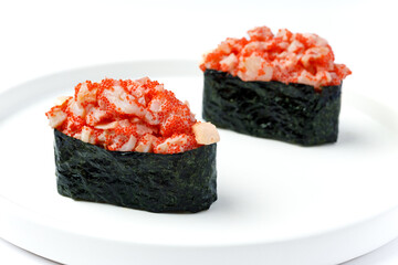 Nigiri with red fish on a white background isolated for menu
