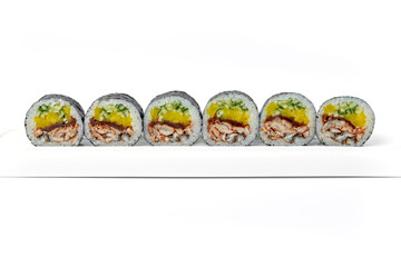 Sushi roll mix on a white dish on a white background isolated