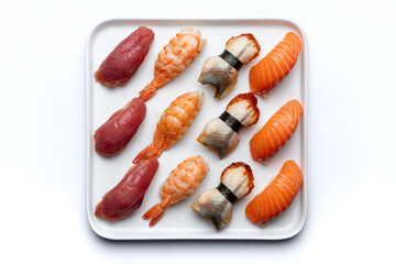 Nigiri set with shrimp, salmon, tuna and eel on a white background isolated