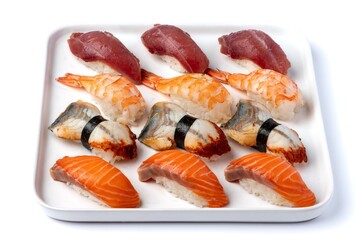 Nigiri set with shrimp, salmon, tuna and eel on a white background isolated