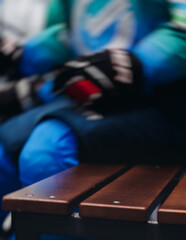 Hockey match game on ice rink arena stadium, team of ice hockey professional players with coach, stick and puck, team of hockey players in protective sport uniform training, hockey league championship