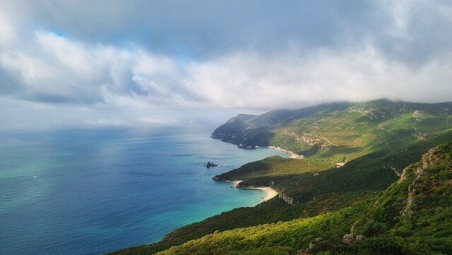 Arrabida Mountains wieh the beach and the clouds