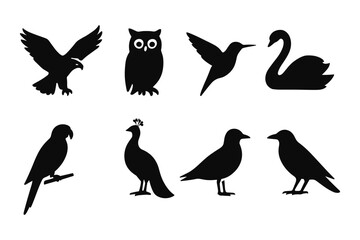 Fototapeta premium Bird silhouette collection featuring owl, swan, and peacock designs