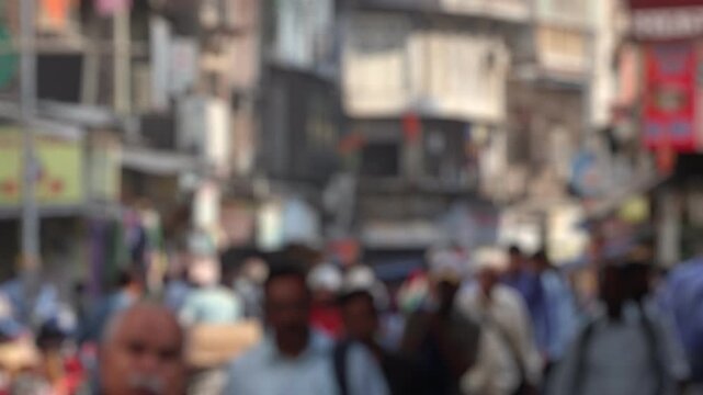 Bokeh view of crowded streets in Mumbai, India. Blurred background footage.