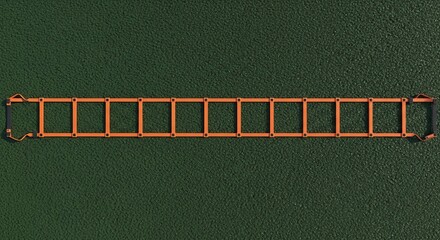 Aerial view of an agility ladder on green turf perfect for fitness training and athletic drills to improve speed and coordination skills