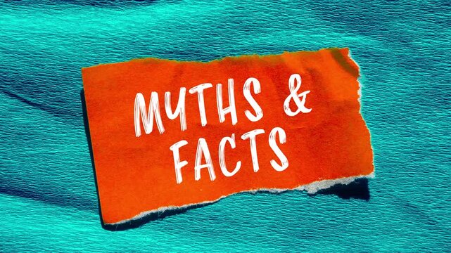 Myths and facts message writing on ripped torn paper background