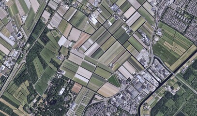 Dutch Tulip Fields: High-Resolution Aerial View of Vibrant Flower Rows and Abstract Agricultural Patterns