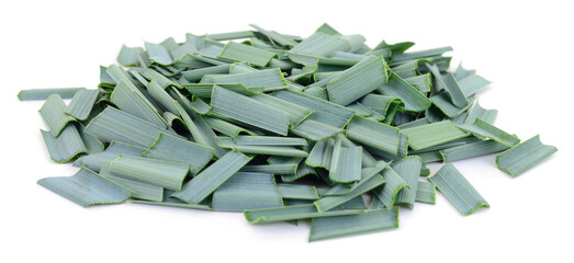 Green plant leaves cut into pieces isolated on white background