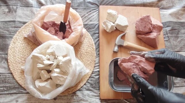 Purple clay stones on a wooden board