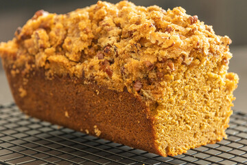 delicious pumpkin bread on dark background close up