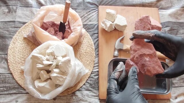 Purple clay stones on a wooden board