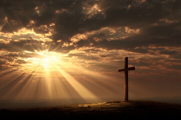 Fototapeta premium Sunlight breaking through clouds over a cross on a hill symbolizing faith and hope