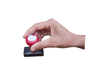 Hand holding self-inking stamp, showing official action and authority, transparent background