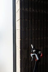 Light from outside the building shines into the part of the electric scooter