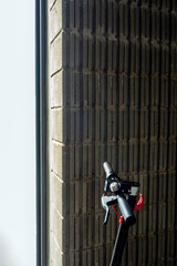 Light from outside the building shines into the part of the electric scooter