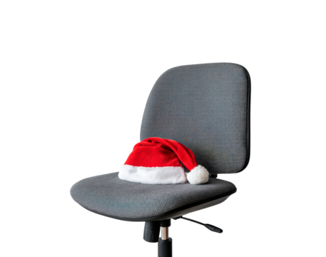 Festive office theme with santa hat and chair symbolizing holiday season at work