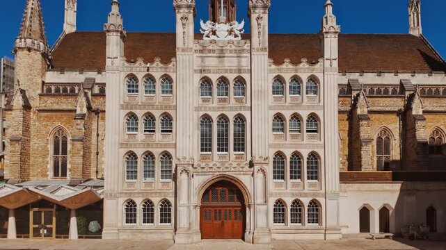 The Guildhall, London, England, UK, stone facade, tracery windows and a formal square