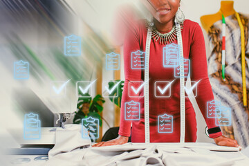 Fashion designer working on clothing design with digital tools in studio during daytime to enhance creativity and efficiency