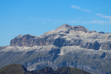 The Dolomites surge upward in fractured beauty, each peak a sculpted sentinel