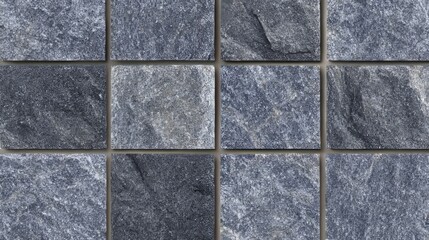 Abstract textured background of blue-grey speckled stone tiles with natural mineral patterns, perfect for architecture, geology, construction, and modern interior design surfaces and material concepts