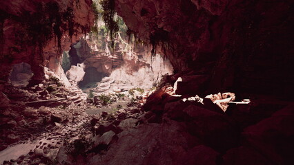 A breathtaking view of a cave reveals greenery and rocky terrain deep within. Sunlight filters through, illuminating the unique formations and inviting exploration in this serene environment.