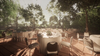 Round tables surrounded by empty chairs are set up in a beautiful garden. Soft sunlight filters through the trees, creating a peaceful atmosphere for a gathering.