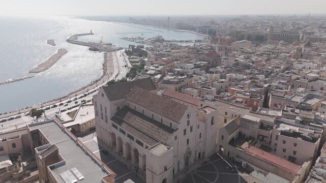 Summer aerial view of Greek coastal town with church and turquoise sea. Aerial view 