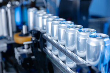 Automated beer canning line in modern brewery factory setting