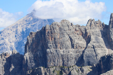 Craggy summits pierce the sky, framed from Nuvolau’s perch in sharp alpine intimacy