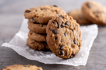 Baked chocolate chip cookies on wooden table