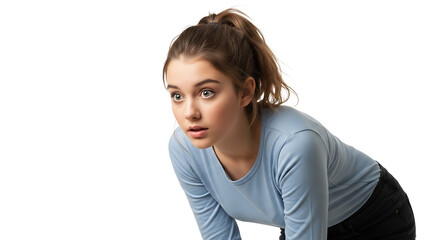 Focused young woman with ponytail, wearing a light blue top, looking intently ahead with anticipation and alertness.