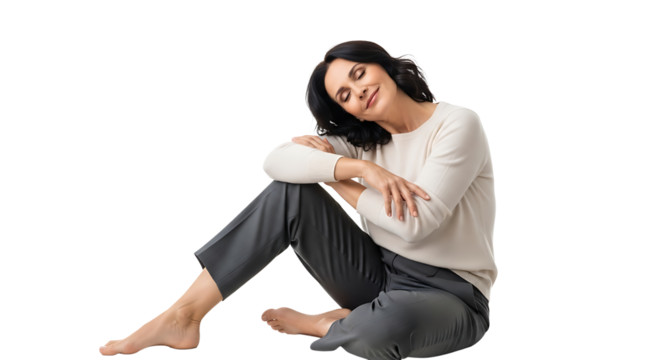 A serene woman is peacefully sitting with closed eyes, embracing tranquility in her moment of quiet reflection.