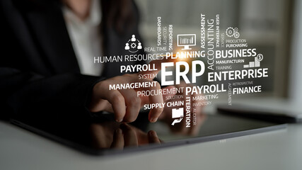 A business professional engages with a digital ERP interface on a tablet, showcasing various enterprise solutions in areas like management, finance, and procurement. Tessel