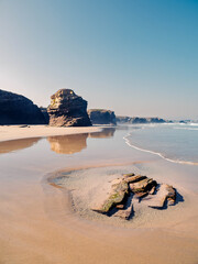 Sunny day at As Catedrais Beach, Lugo, Galicia, Spain. A bright sunny day in northern Spain.Sunny day at As Catedrais Beach, Lugo, Galicia, Spain. A bright sunny day in northern Spain.